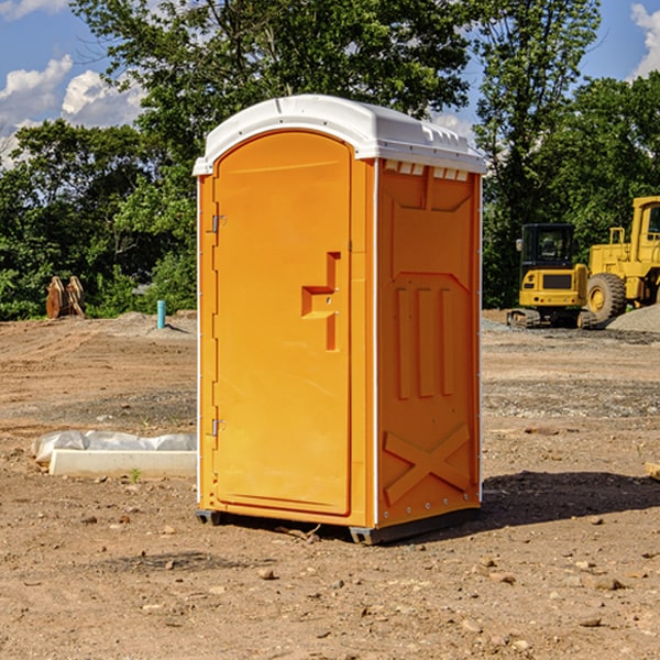 how often are the portable restrooms cleaned and serviced during a rental period in Jarvis